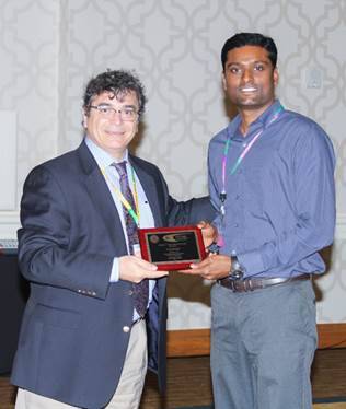 Dr. Sridhar Jaligama receiving the Gabriel L. Plaa Education Award (3rd place) from Vasilis Vasiliou at the 2016 Society of Toxicology meeting in New Orelans, LA.