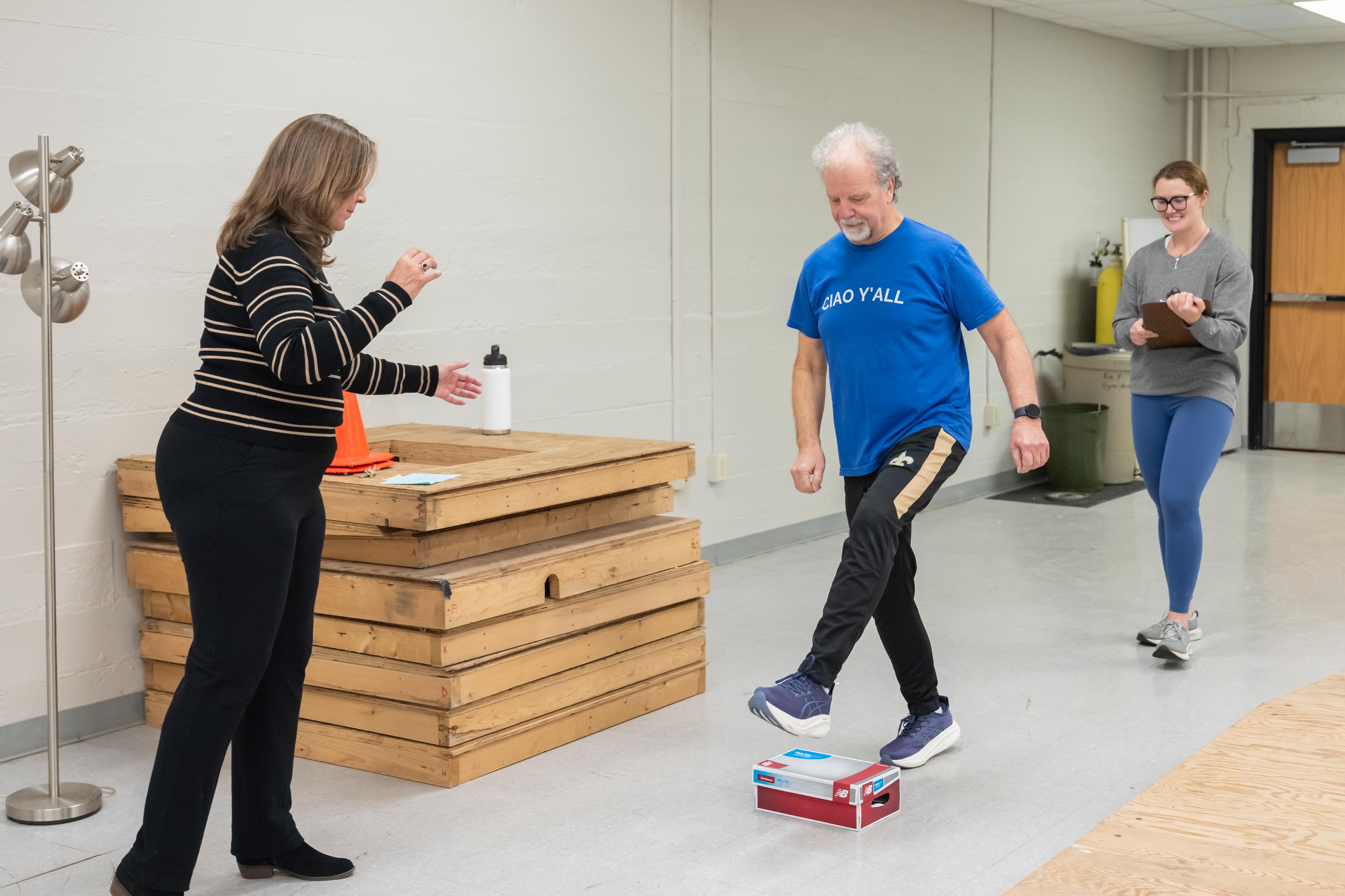 ProfessorJan Hondzinski and grad student Taylor Gauss conduct a Parkinson's assessment