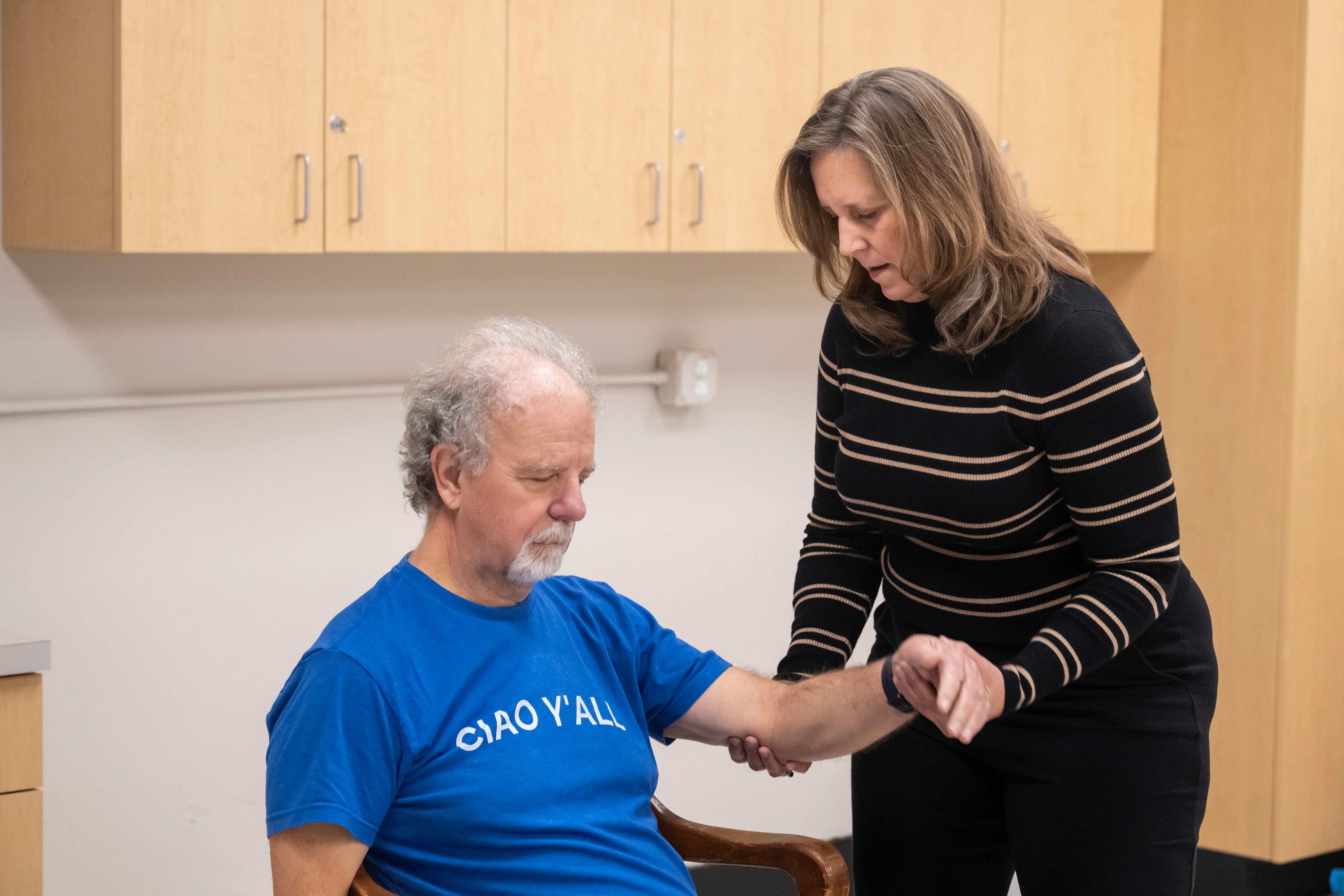 Professor Jan Hondzinski conducts a Parkinson's assessment