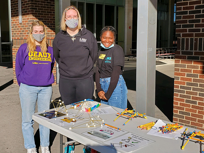 Mariana and LSU Engineering students volunteer at STEM event.