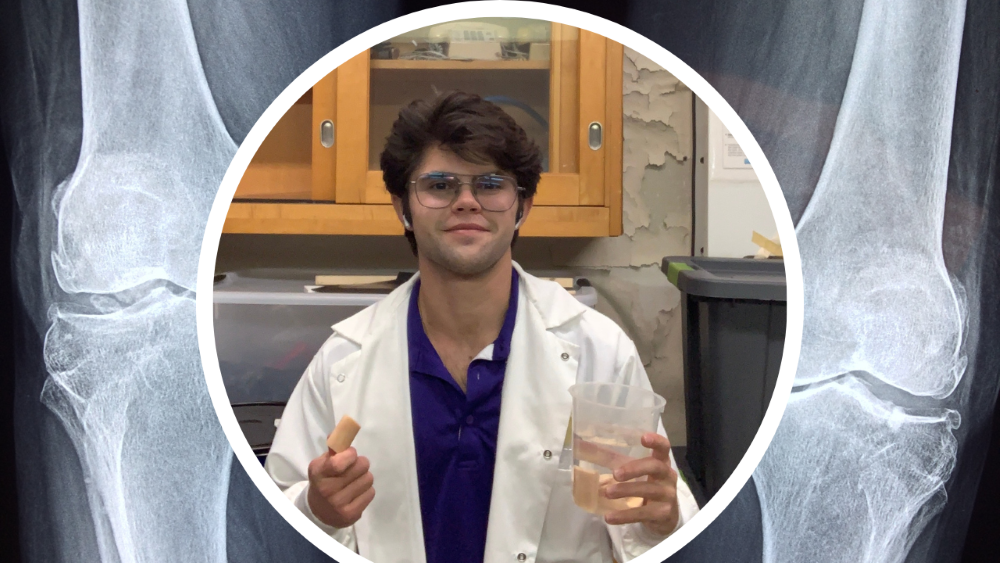 Ashton Dalton in lab coat