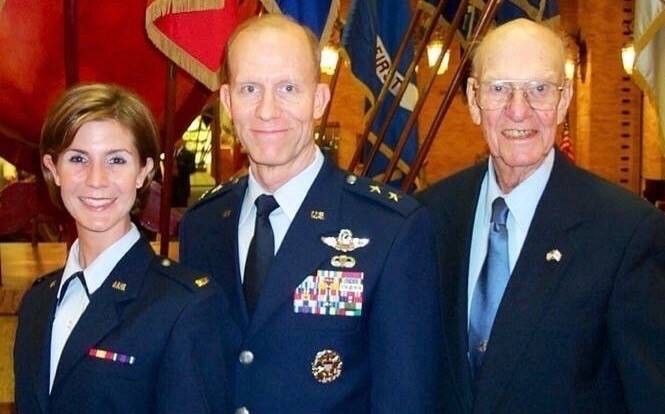 Col. Lisa O'Neil poses with her father and grandfather