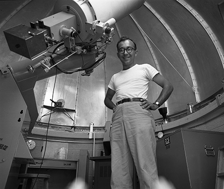 Astronomer Arlo Landolt with telescope