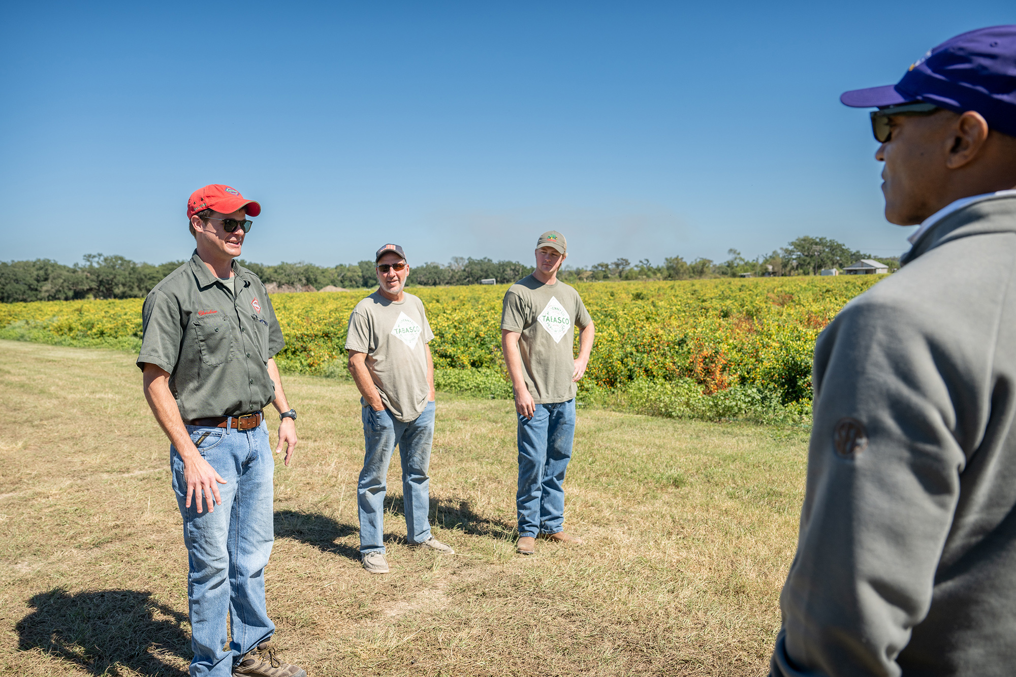  Group of people talk about how Tabasco hot sauce is made 