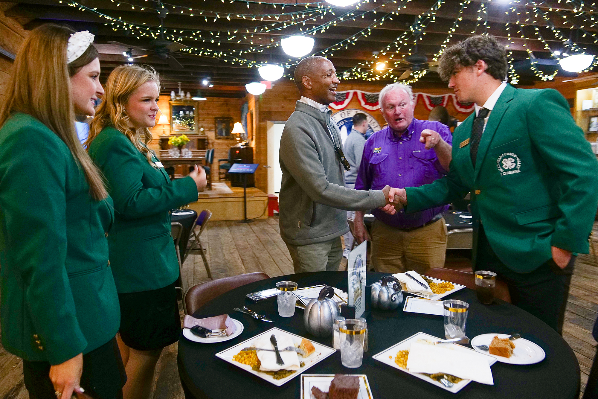 President Tate meets with young people at the Louisiana Political Museum.