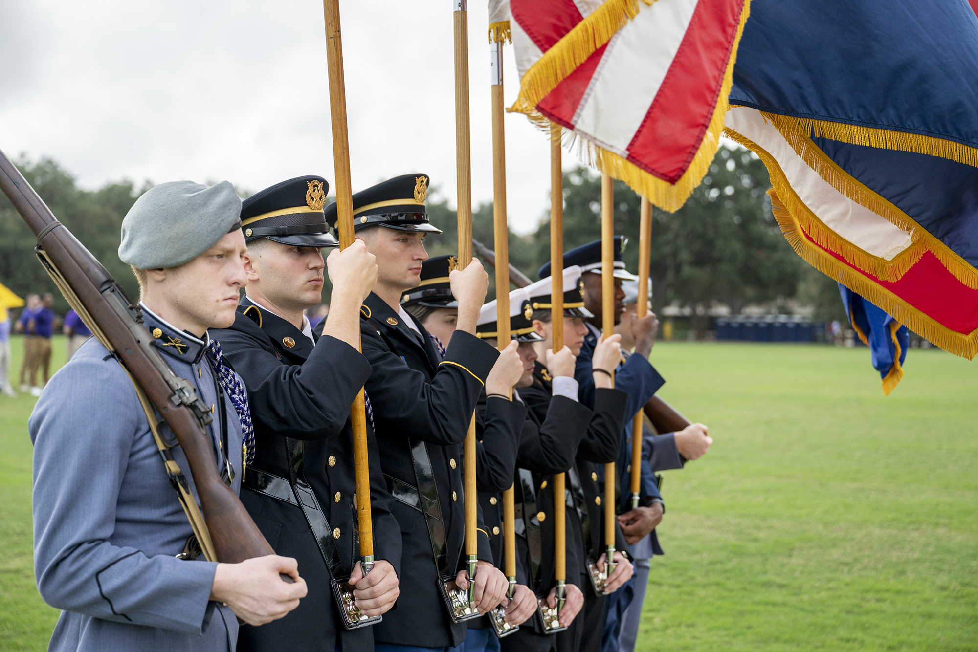 Flag corps stands at attention on LSU Parade Grounds