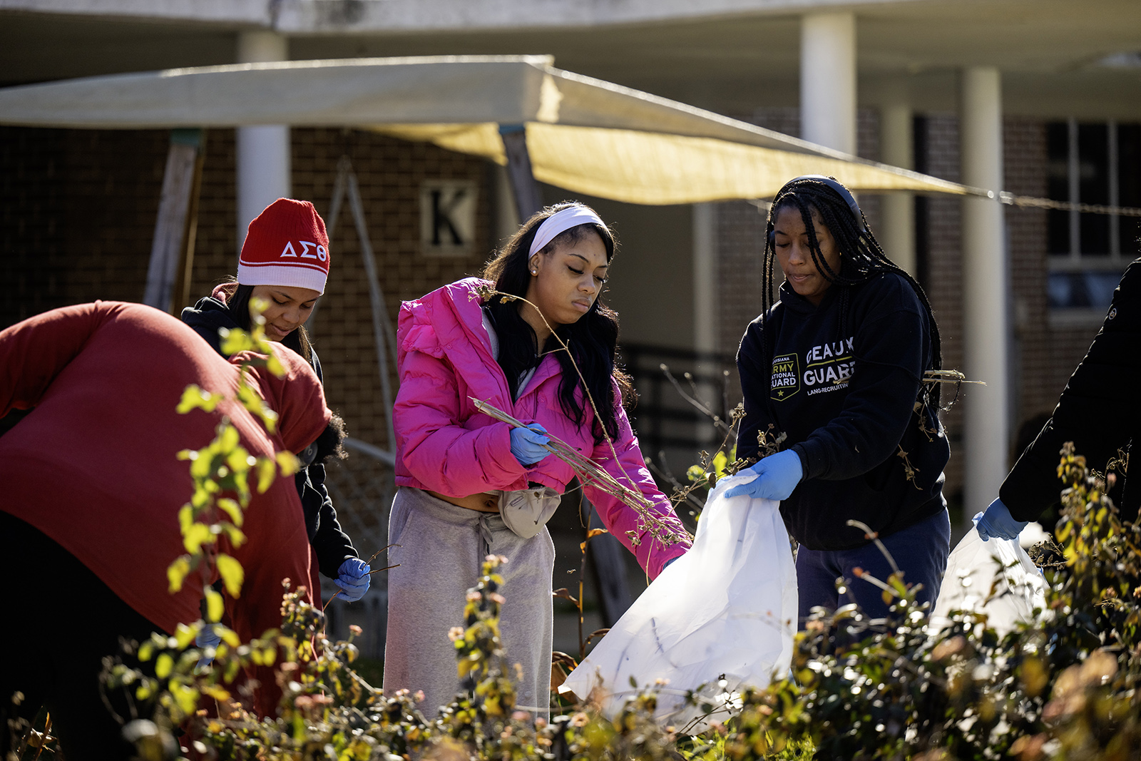 Student collect and bag debris during MLK Day of Service events