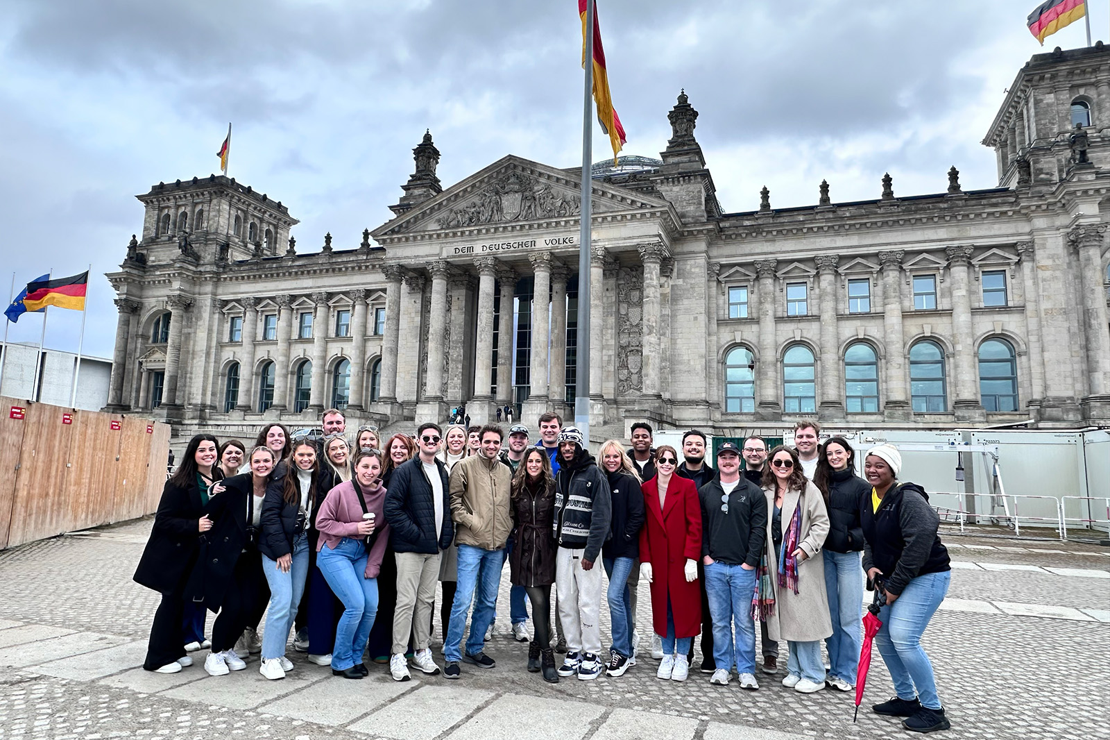 Students posing in front of the German Reichstag building