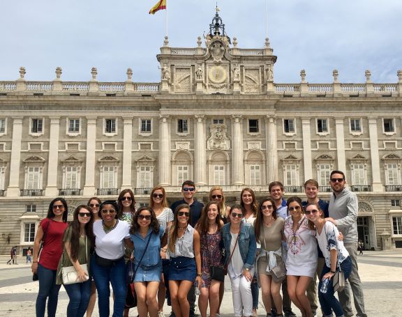 Group of people in front of building in Madrid
