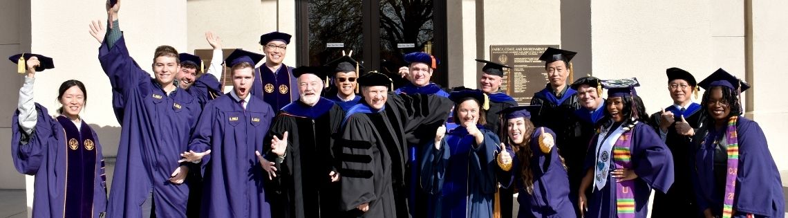A diverse group of CC&E graduates in caps and gowns make silly faces at the camera