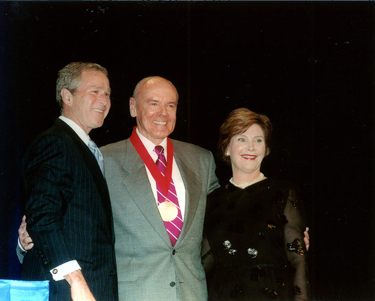 Richard Peck receiving the National Humanities Medal with President George W. Bush and First Lady Barbara Bush