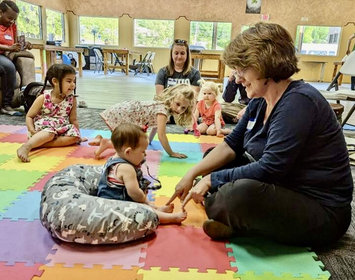 Kamile Geist engaging in early childhood learning methods