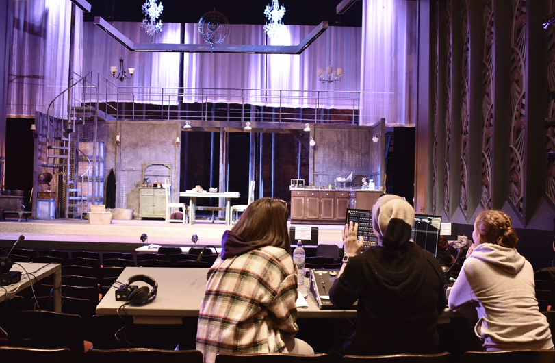 Image of students working in the theatre