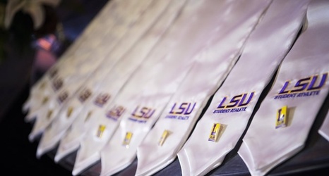 White athletic stoles on a table celebrating student athletes.