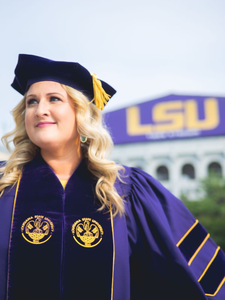 Dr. Fish is pictured here standing in front of Tiger Stadium