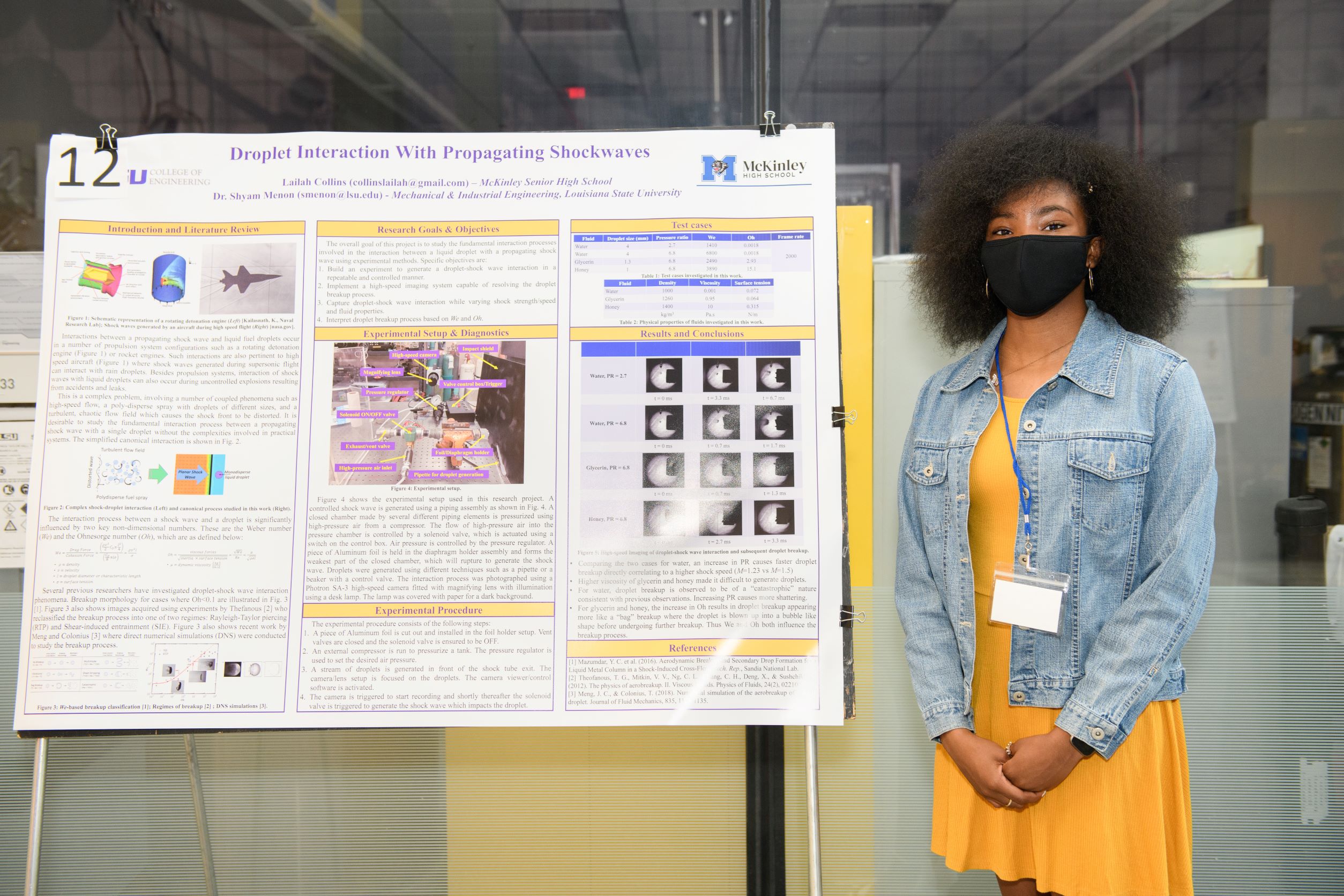 Lailah Collins posing with poster presentation