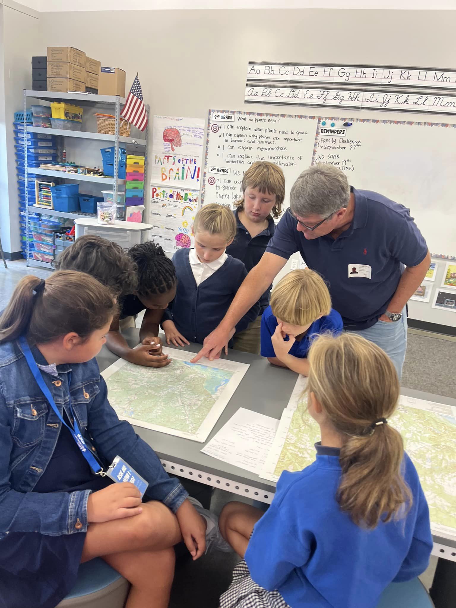 Dr. Leitner discusses maps with the students