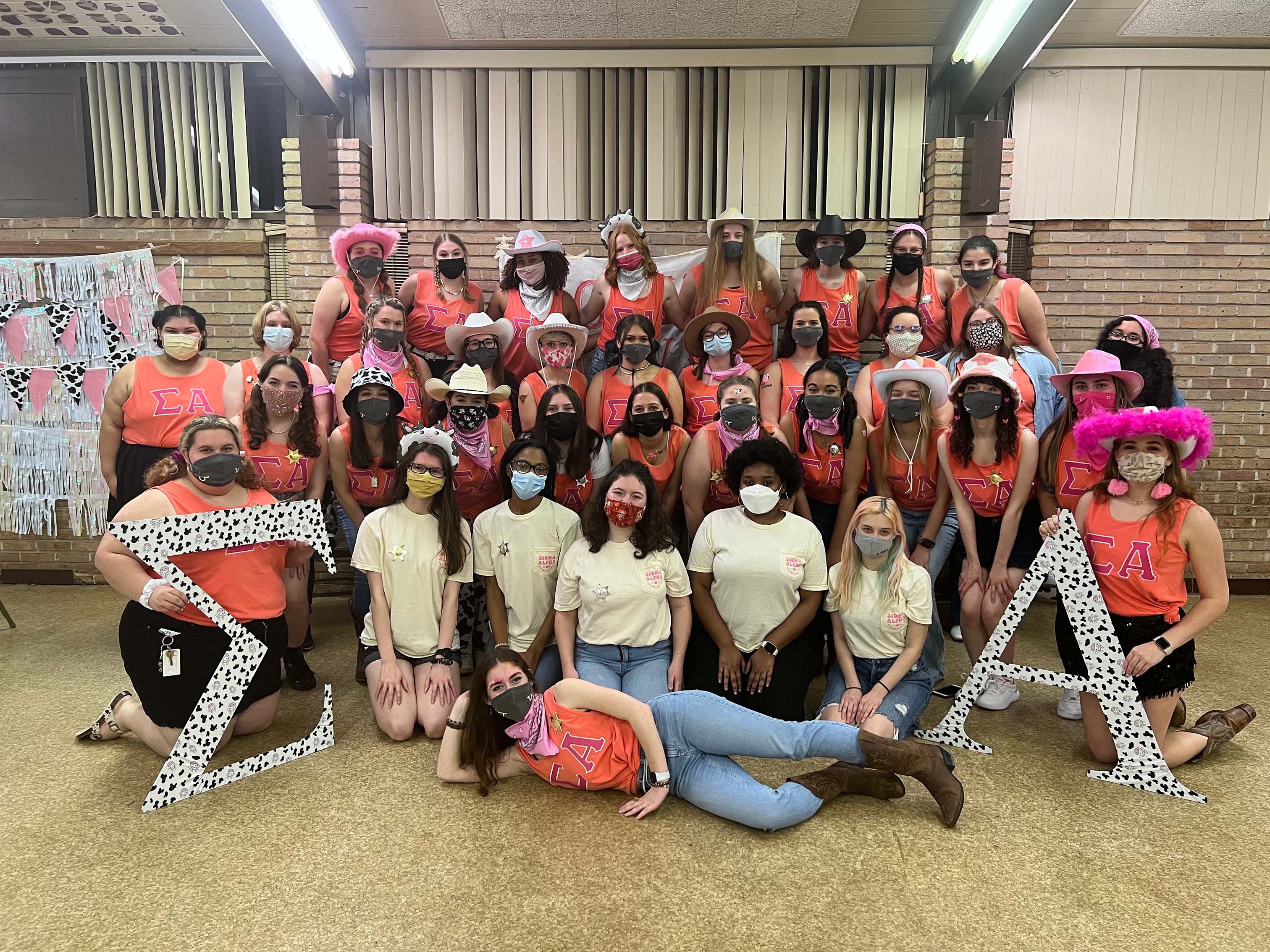 sorority members pose in large group