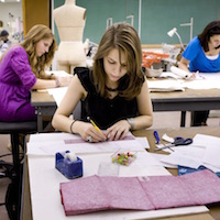 Student works on fashion project.