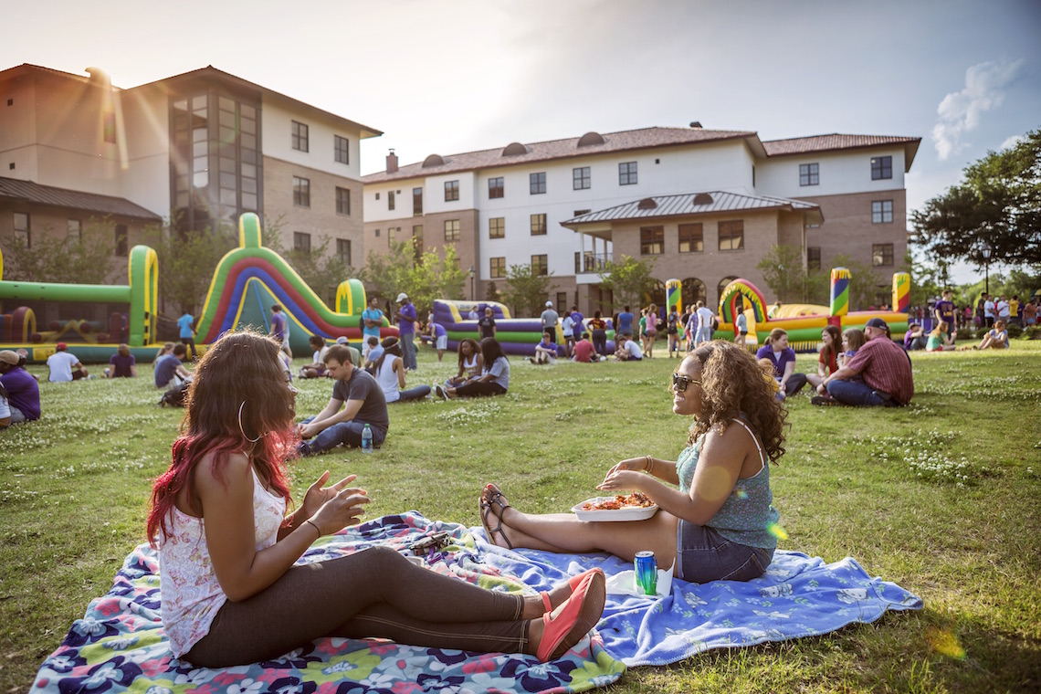 Students sitting outside of Res College One