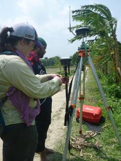 PhD student Leslie Valentine works with Dhaka University student Arifur Rahman to take detailed elevation transects of the Ganges-Brahmaputra delta
