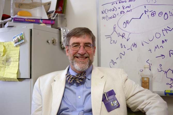 Professor Dr. John Pojman from LSU seated in his lab.