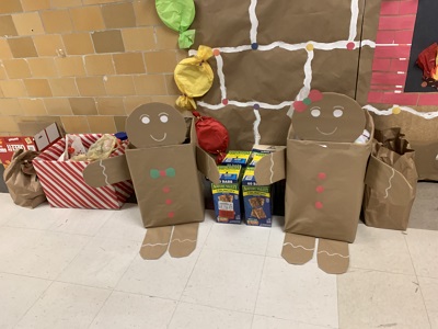 Gingerbread Men collecting Food Donations