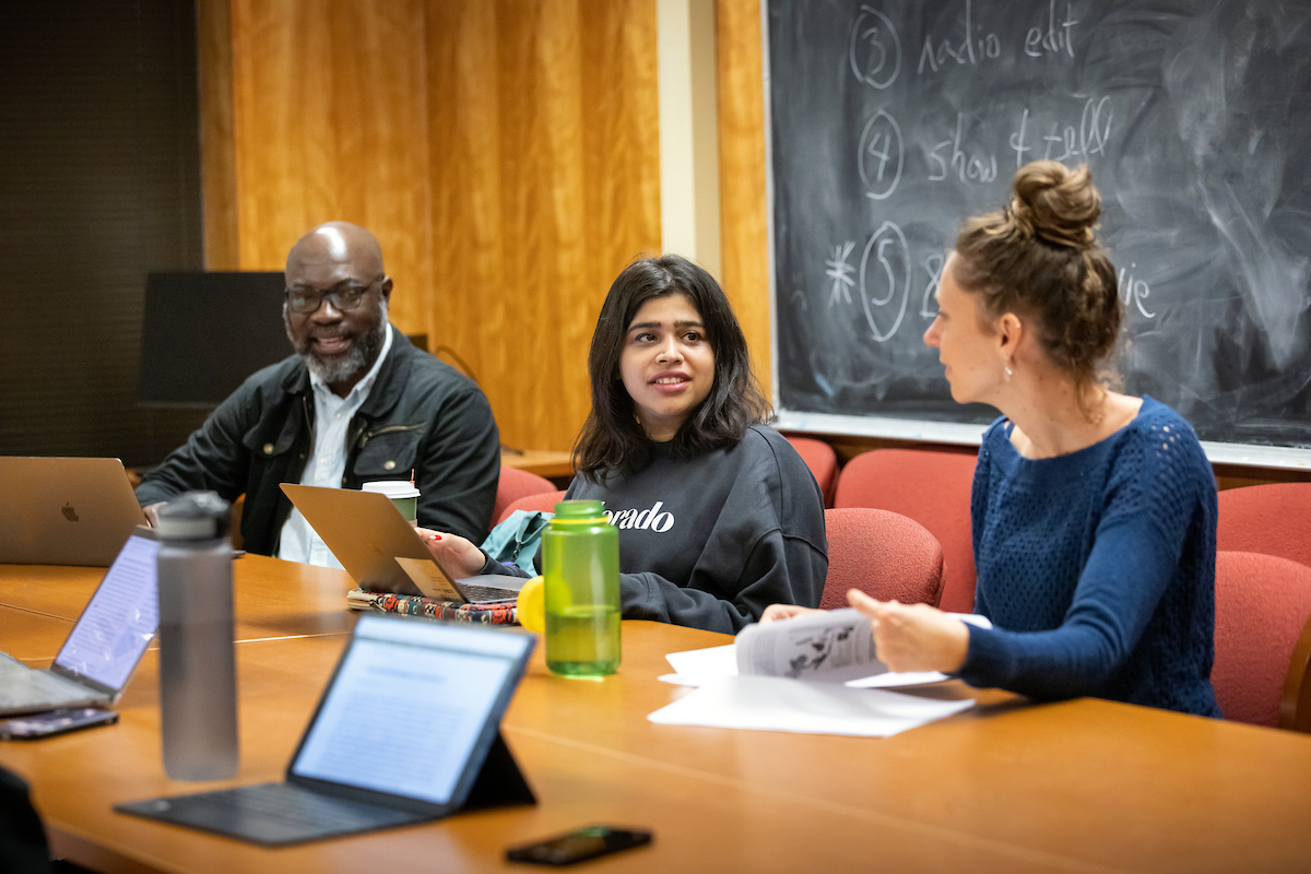students discuss with mentors