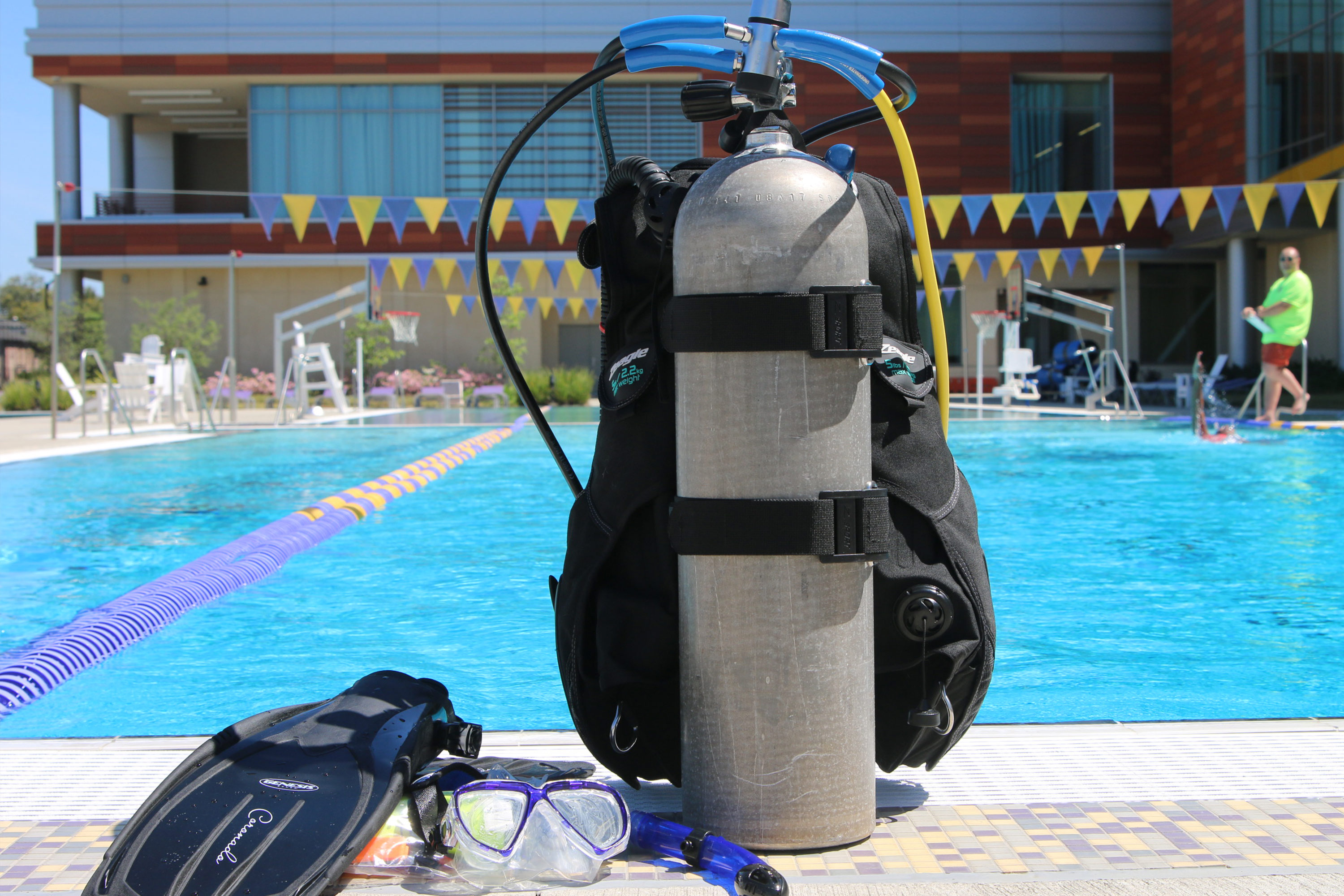 scuba diving gear next to the pool