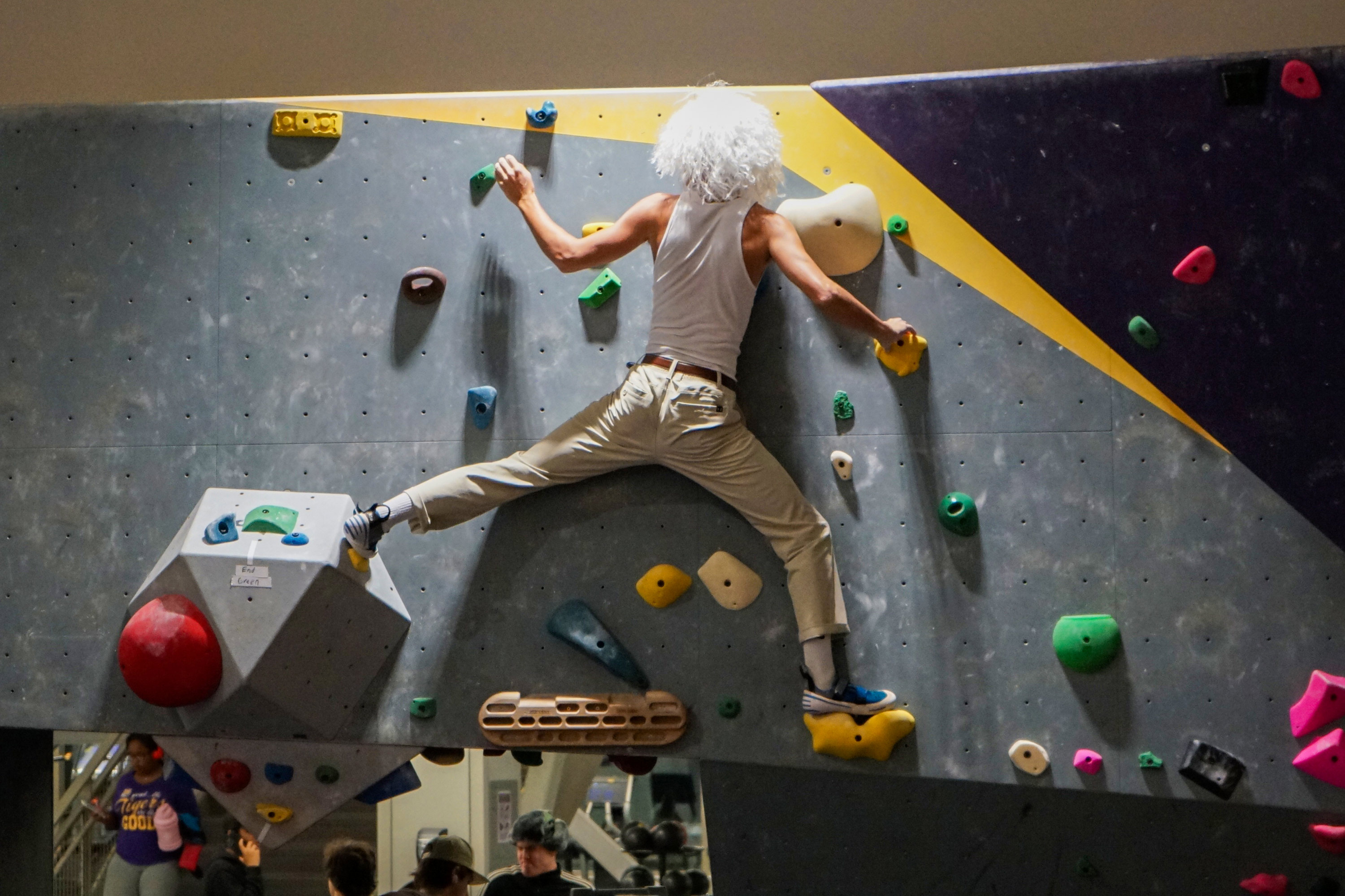 climber on the bouldering wall