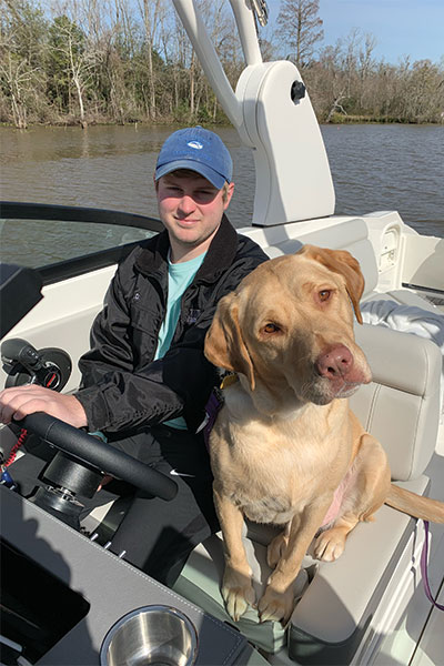 Bud and John on a boat